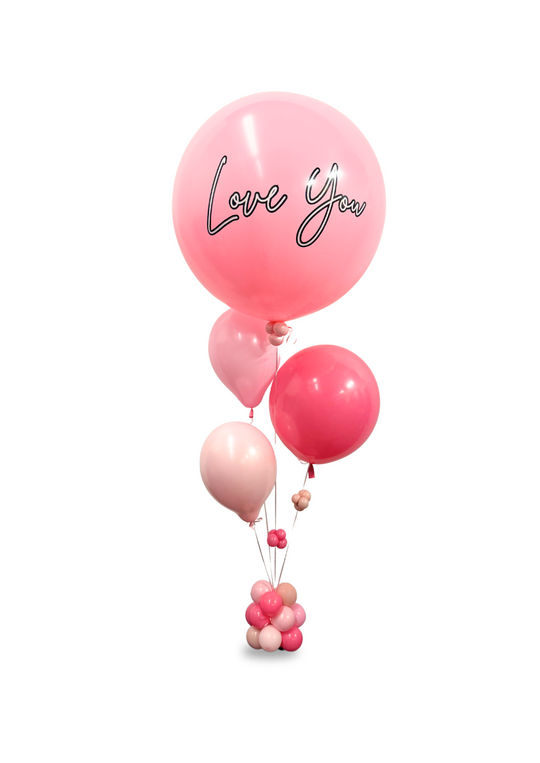 Table centerpiece with custom jumbo balloon