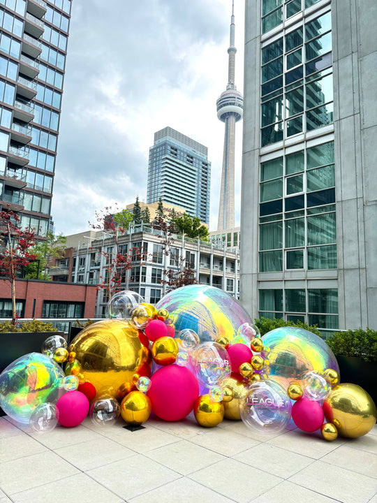Sphere balloon install with gold and iridescent