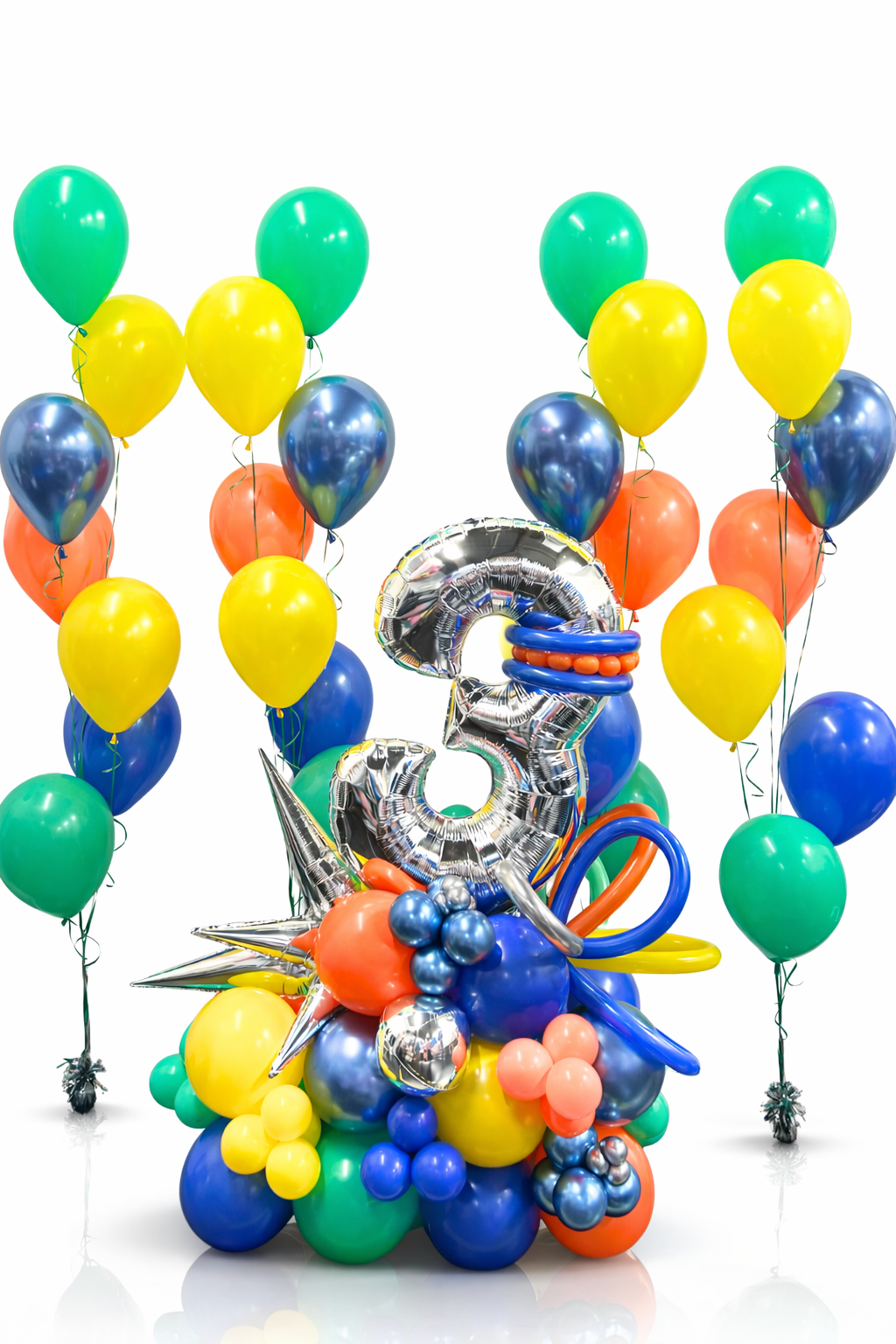 Colorful balloon arrangement with a silver number '3' on a white background