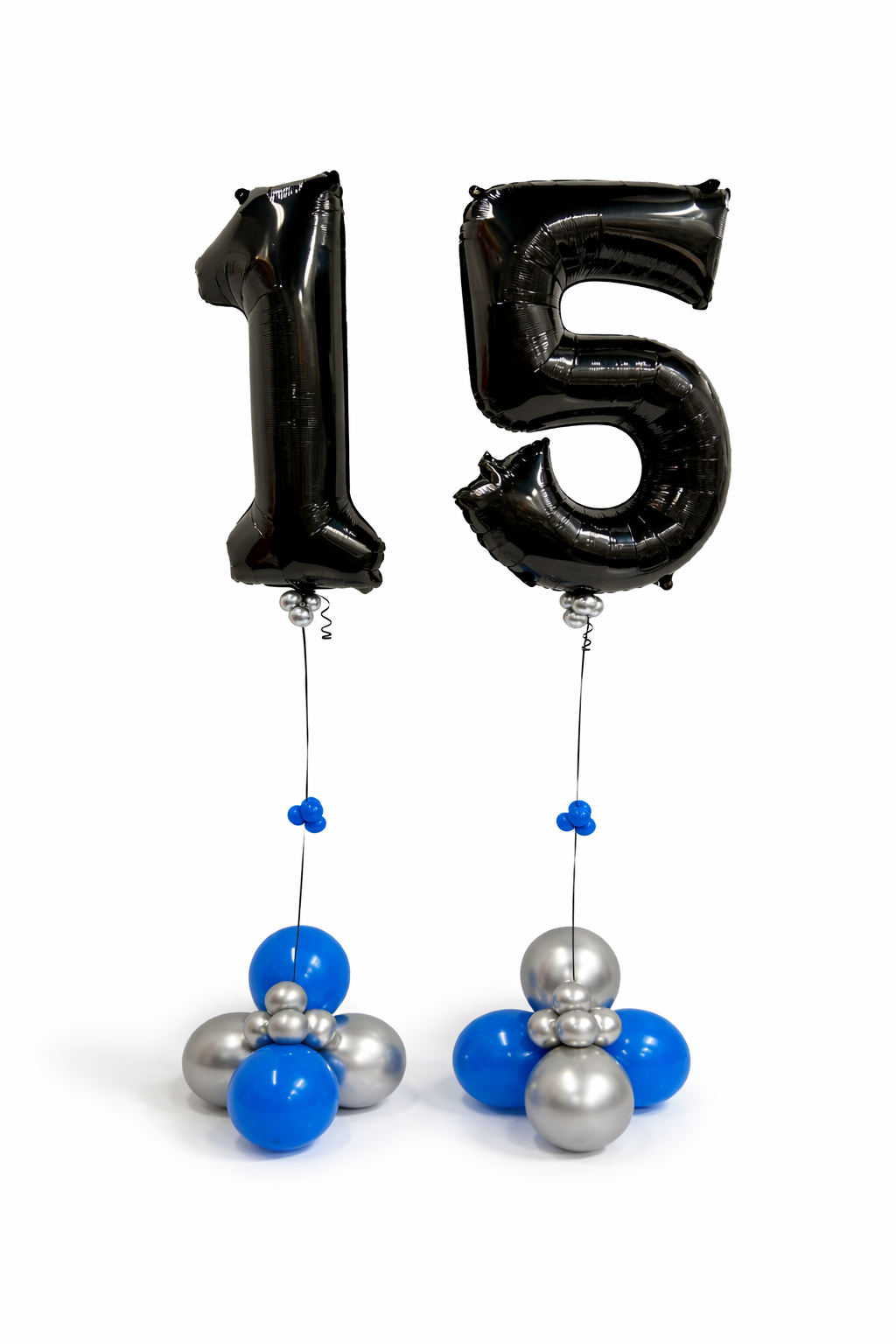 Black number '15' balloons with blue and silver decorations on a white background