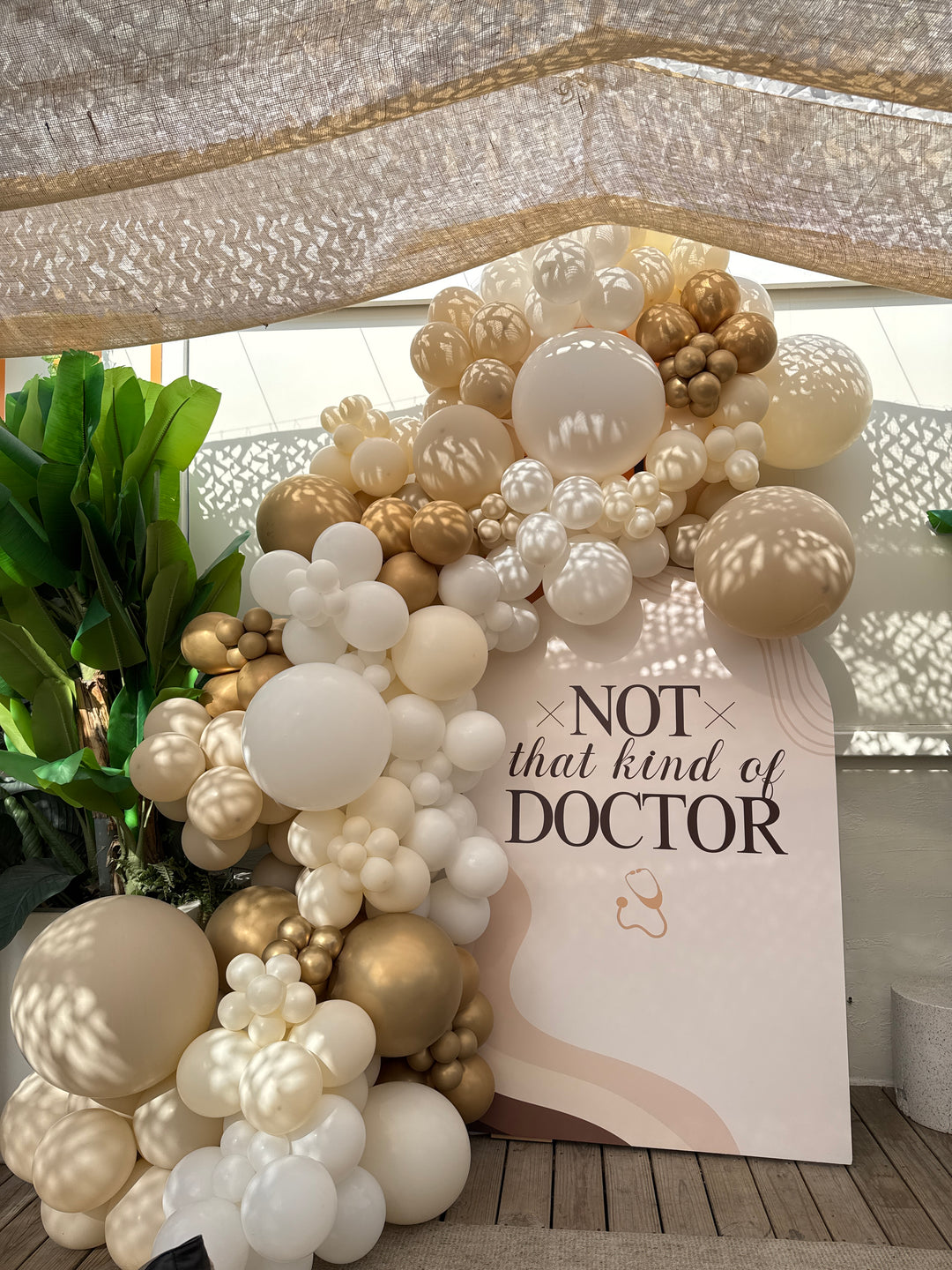 Custom wall backdrop with garland