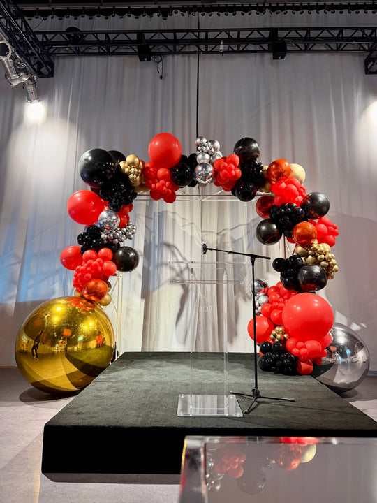 UPS custom balloon install with shimmer wall and welcome desk reception and Marquees