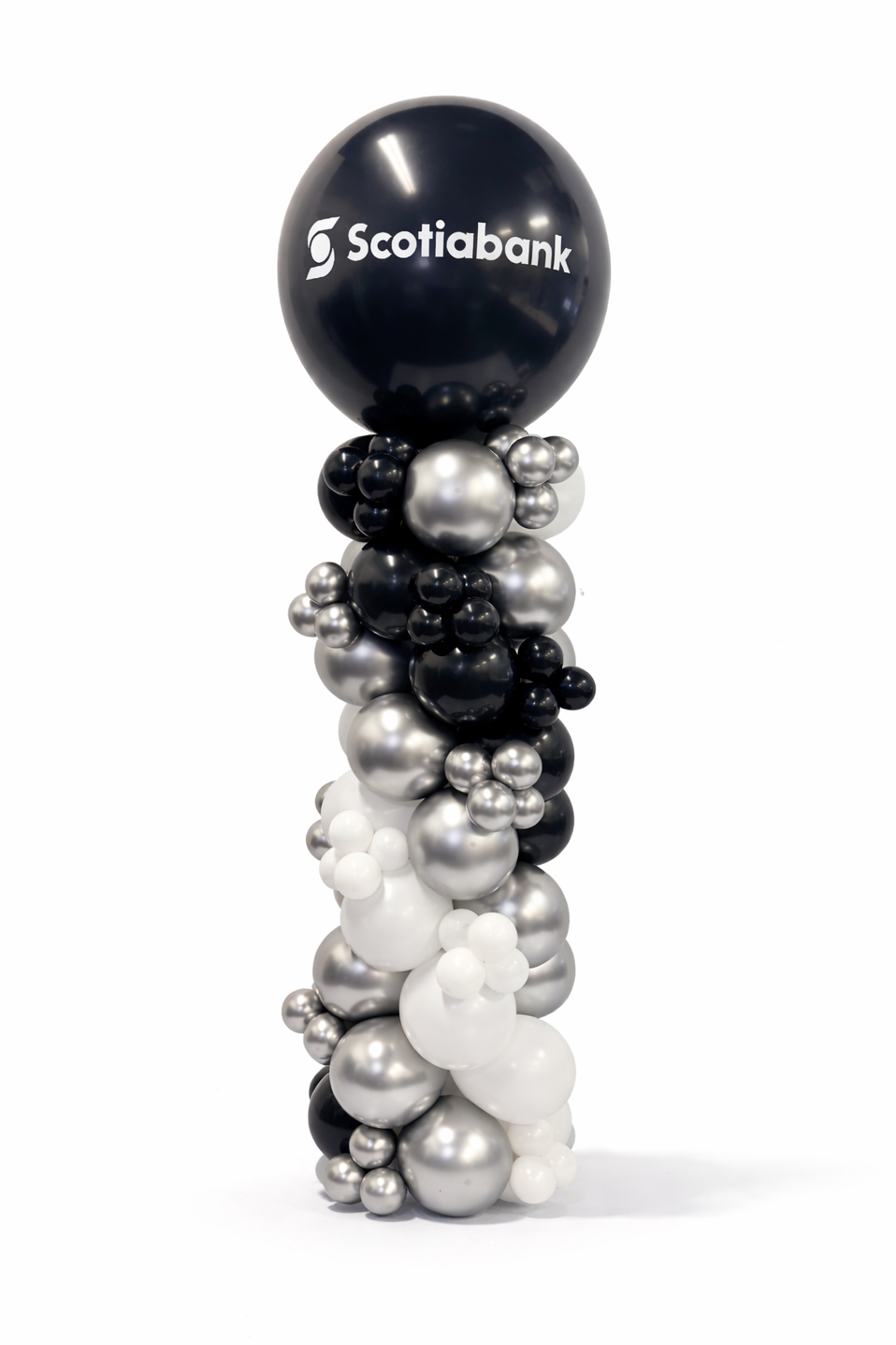Balloon sculpture with black, silver, and white balloons featuring the Scotiabank logo on a white background.