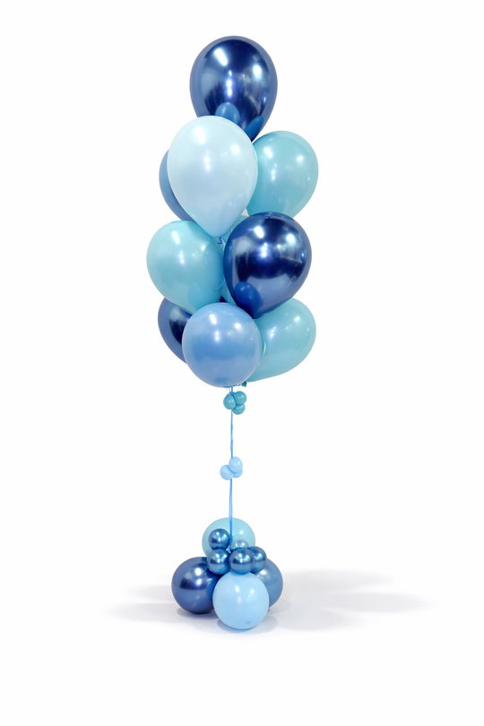 Blue and light blue balloons tied together on a white background