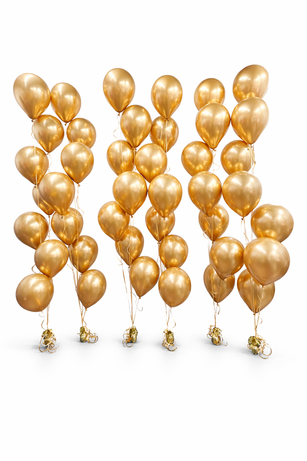 Gold balloons arranged to spell out 'K' on a white background
