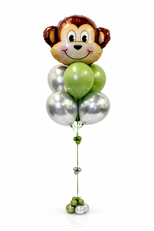 Balloon shaped like a monkey face with green and silver balloons on a white background