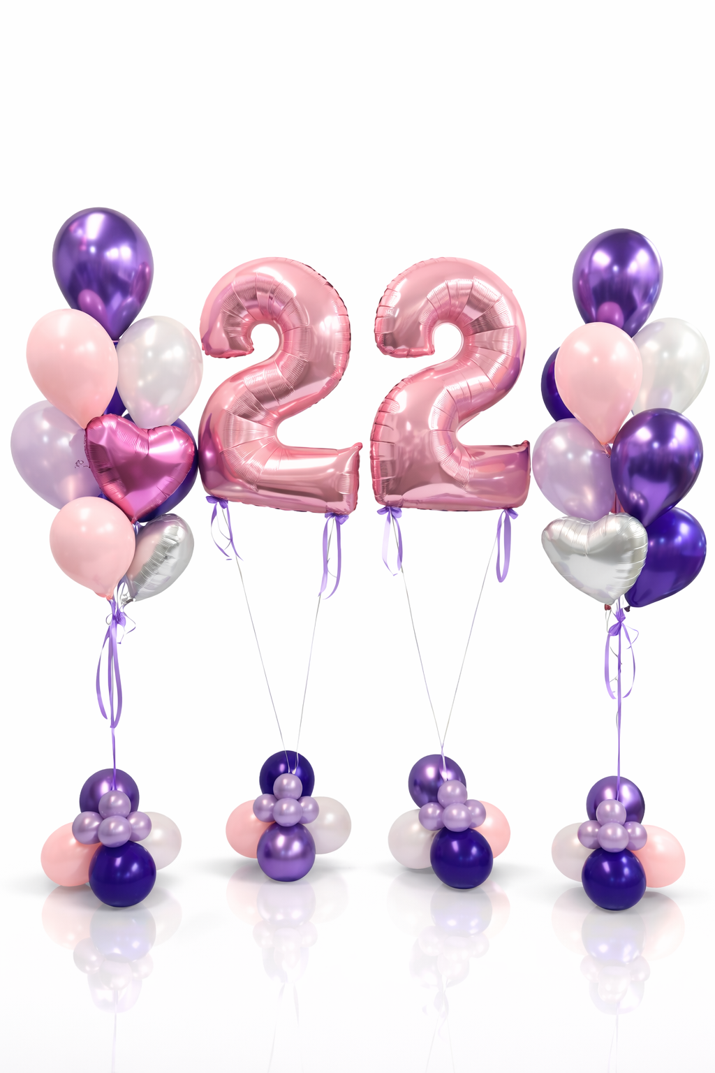 Pink and purple balloons with number '22' on a white background