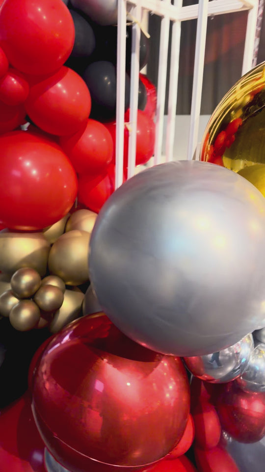 UPS custom balloon install with shimmer wall and welcome desk reception and Marquees