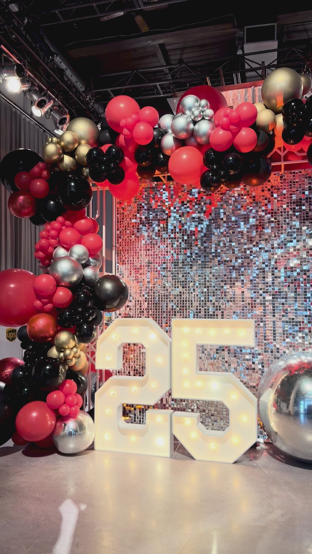 UPS custom balloon install with shimmer wall and welcome desk reception and Marquees