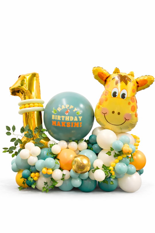 Balloon arrangement with a giraffe, number 1, and 'Happy Birthday' balloon on a white background